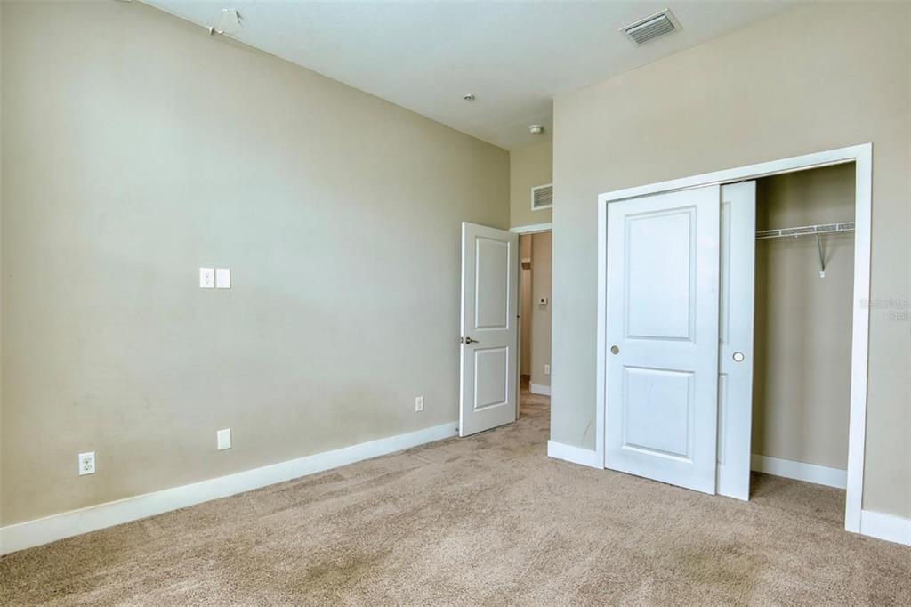 1801 Houston Street Kissimmee, FL 34743 - Photo 26 of 32 an empty room with closet area
