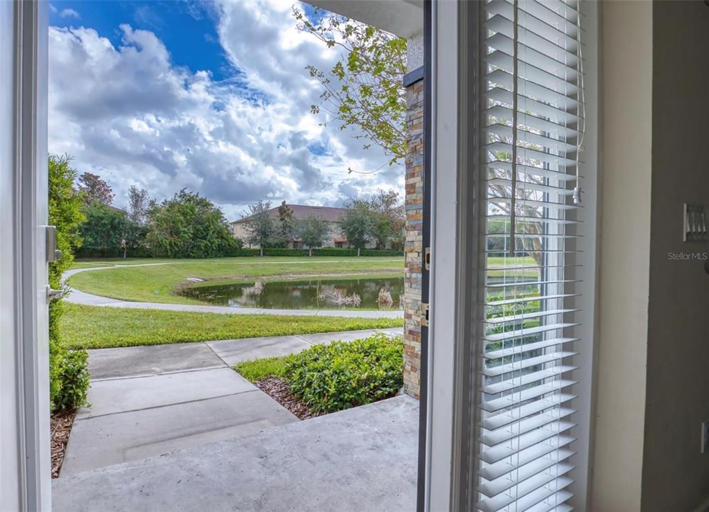 1801 Houston Street Kissimmee, FL 34743 - Photo 3 of 32 a view of swimming pool from a window