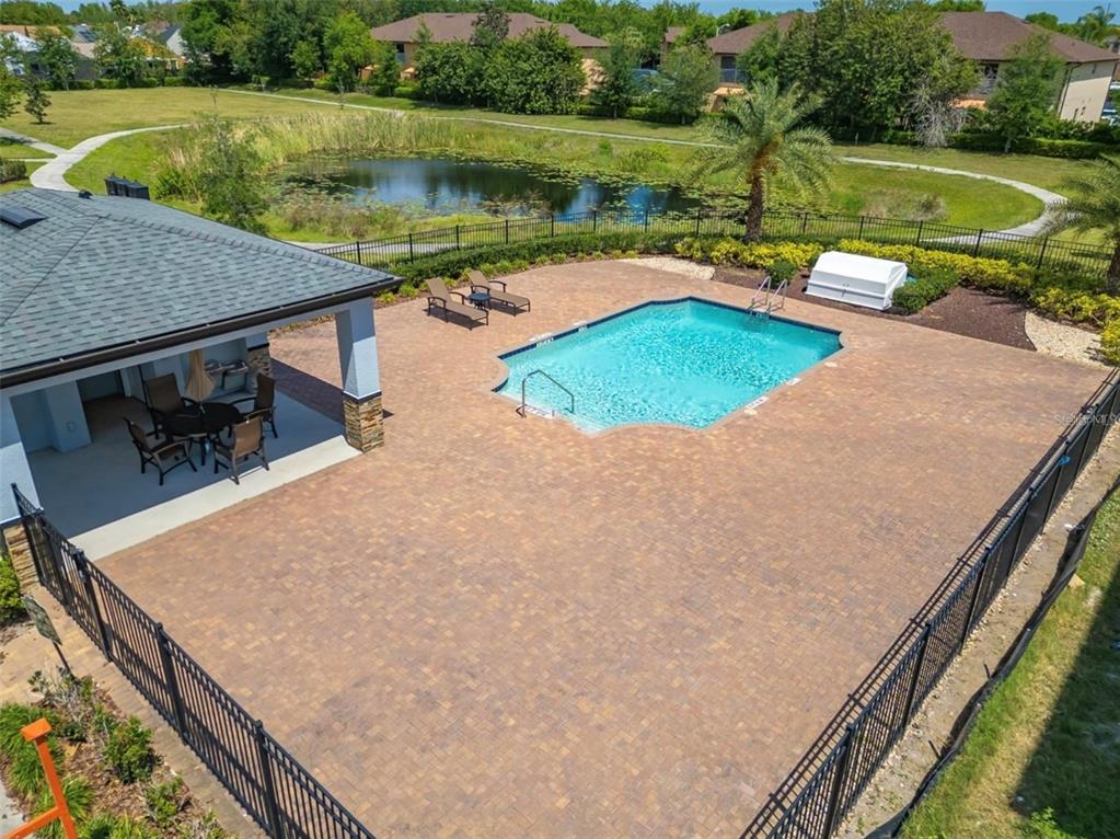 1801 Houston Street Kissimmee, FL 34743 - Photo 31 of 32 a view of a lake with a yard and outdoor seating