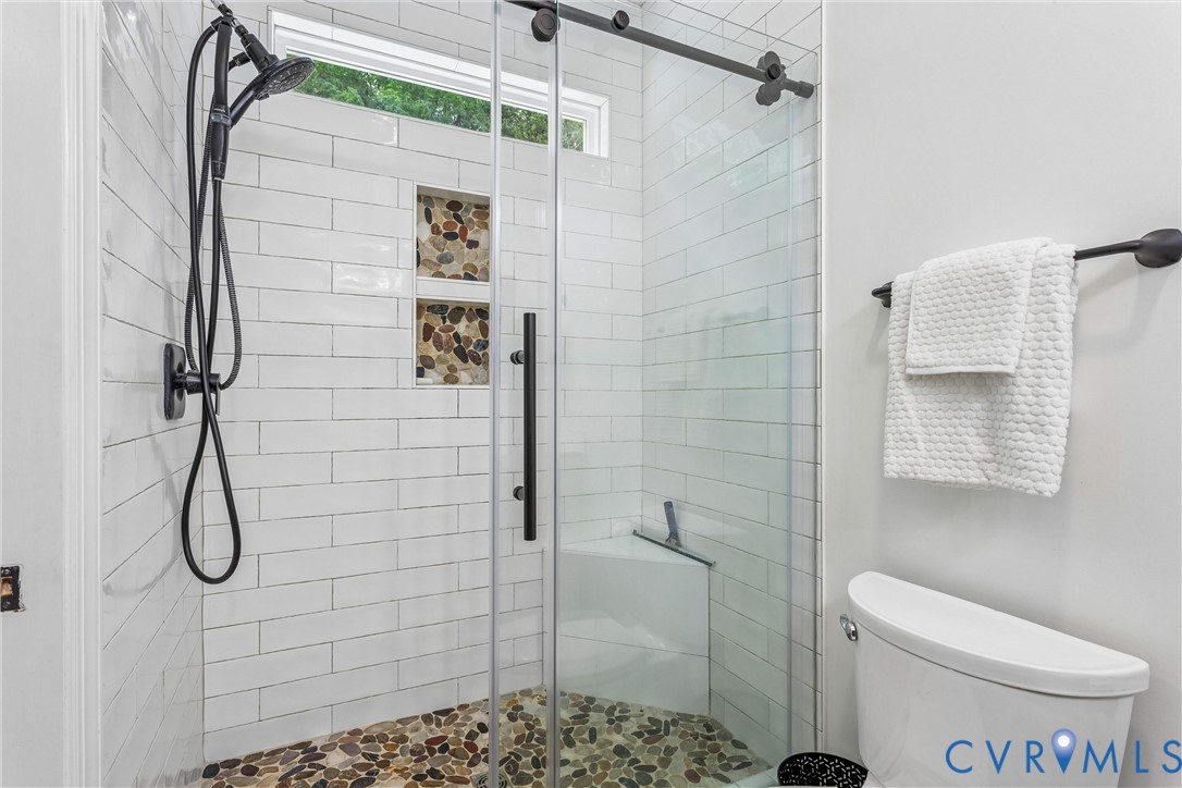 2016 Forge Road Toano, VA 23168 - Photo 66 of 99 Glass-enclosed shower with pebble-tile flooring, w