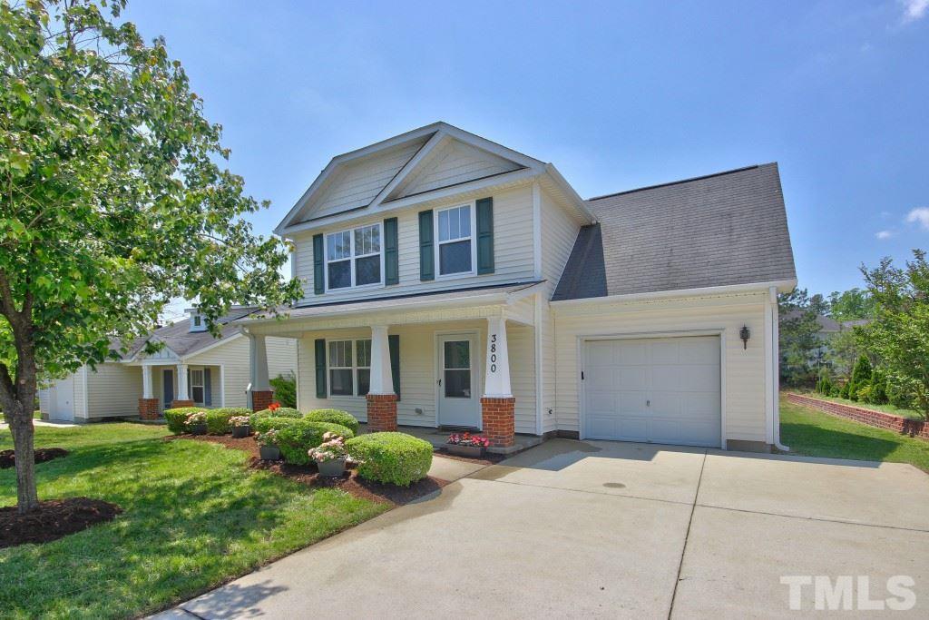 3800 Hopper Street Raleigh, NC 27616 - Photo 1 of 18 a front view of a house with a garden and yard