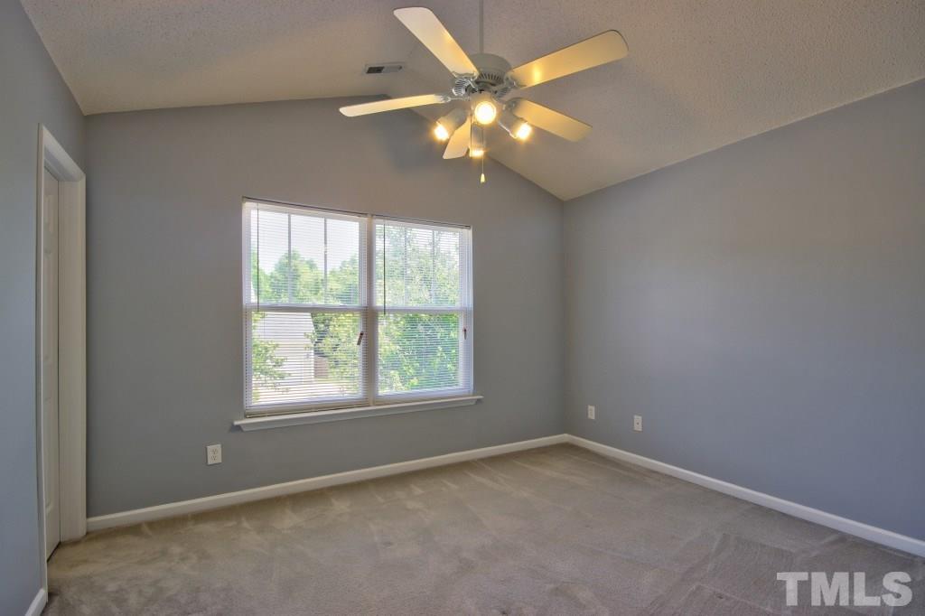 3800 Hopper Street Raleigh, NC 27616 - Photo 9 of 18 an empty room with a window