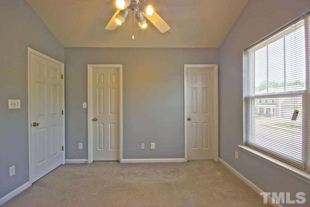 3800 Hopper Street Raleigh, NC 27616 - Photo 10 of 18 a view of an empty room with a window