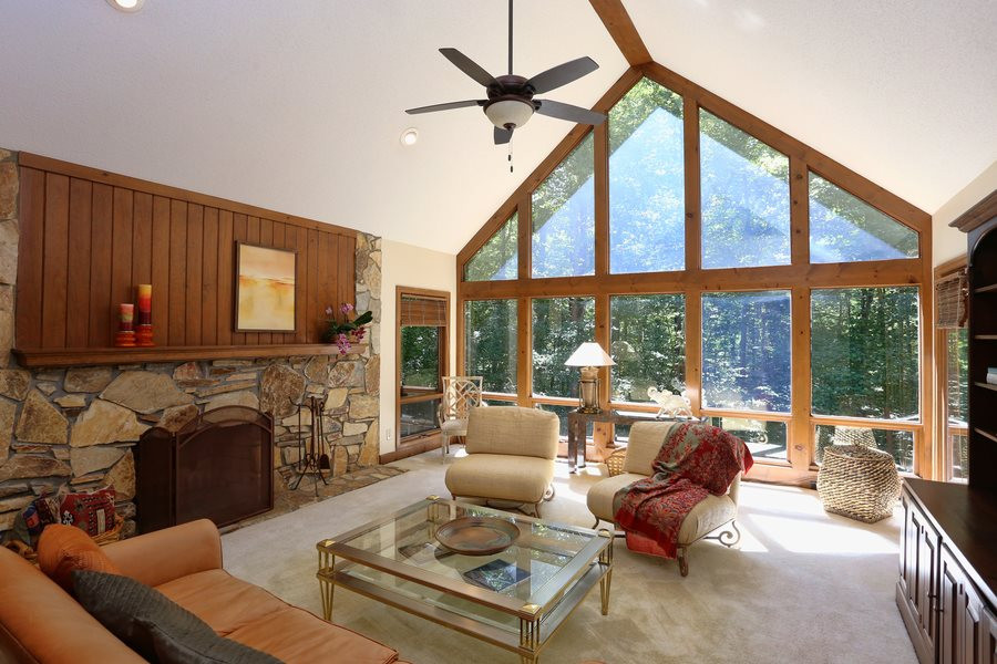10420 Whitestone Road Raleigh, NC 27615 - Photo 4 of 24 Huge family room .but still warm and friendly Wall of windows, incredible natural light and views. Great Room
