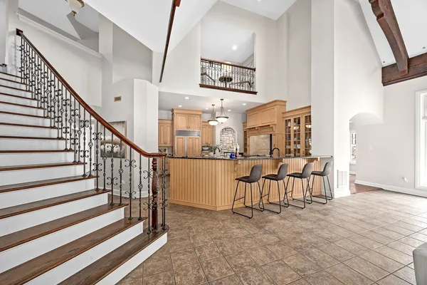 a kitchen with stainless steel appliances granite countertop a sink and cabinets