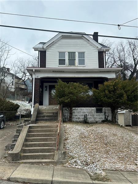 12 Elizabeth Street Pittsburgh, PA 15210 - Photo 1 of 32 a front view of a house with stairs
