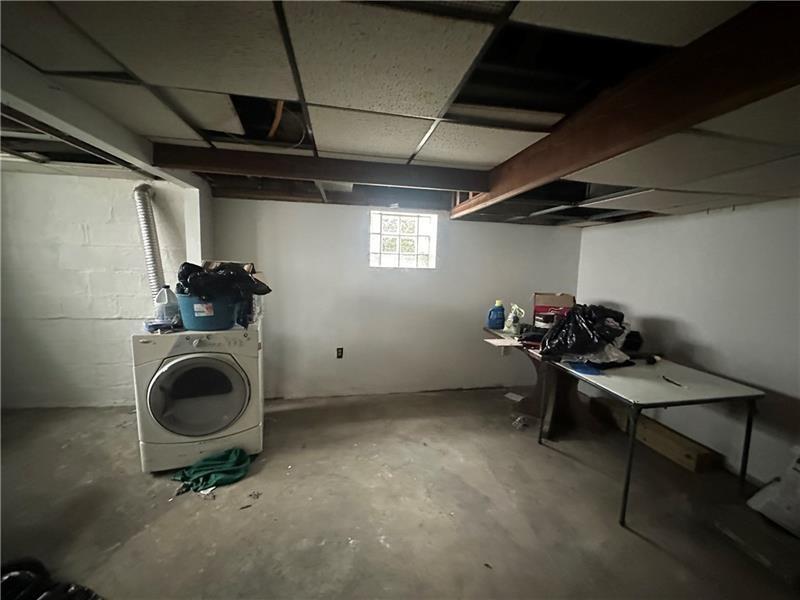12 Elizabeth Street Pittsburgh, PA 15210 - Photo 28 of 32 a view of a room with gym equipment