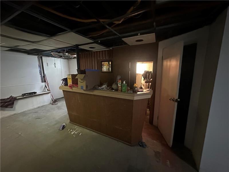 12 Elizabeth Street Pittsburgh, PA 15210 - Photo 31 of 32 a view of a room with wooden floor
