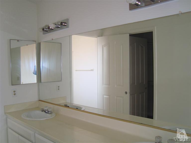 410 Johnson Road Oxnard, CA 93033 - Photo 10 of 10 a bathroom with a sink and shower