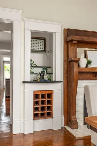 a bathroom with a sink mirror vanity and toilet