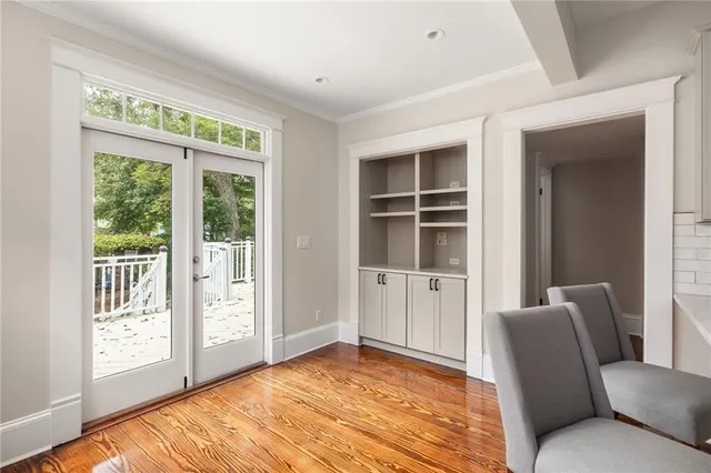 a view of a hallway with washer and dryer