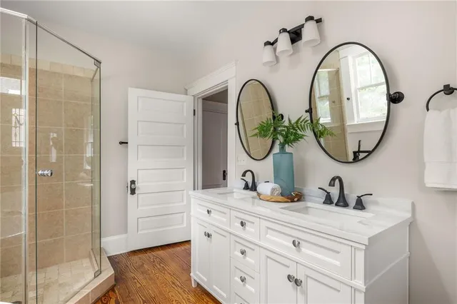 a view of balcony with wooden floor and seating space