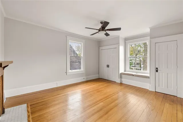 a house with a tree in the back yard