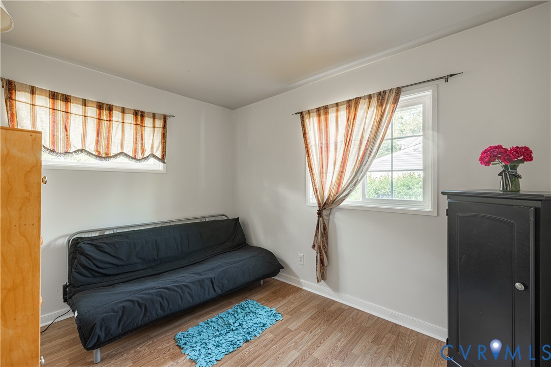 9217 Fisk Road Richmond, VA 23229 - Photo 19 of 39 a living room with furniture and a window