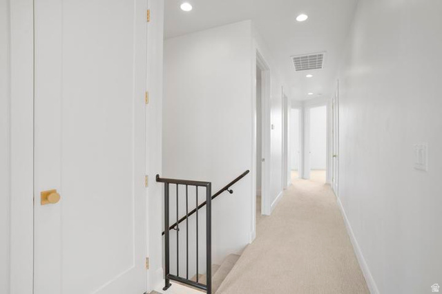 990 Manen Street Washington, UT 84780 - Photo 27 of 43 Bright hallway with recessed lighting and light-colored carpeting