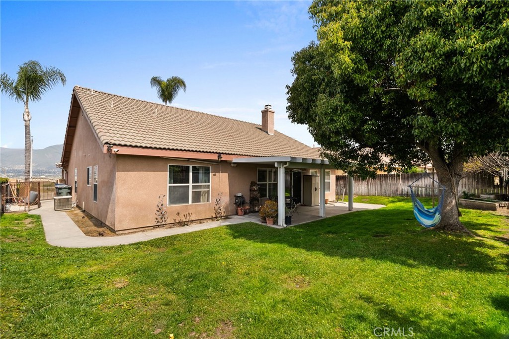 944 Riverview Drive Redlands, CA 92374 - Photo 25 of 32 a view of a house with pool and garden