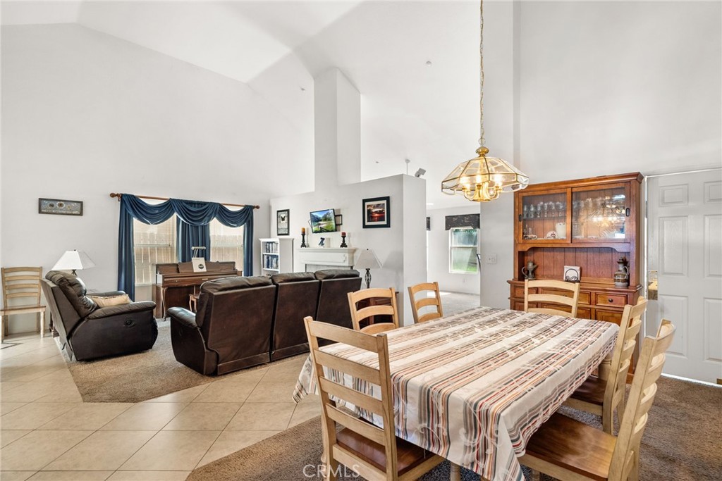 944 Riverview Drive Redlands, CA 92374 - Photo 6 of 32 a dining room with furniture and chandelier