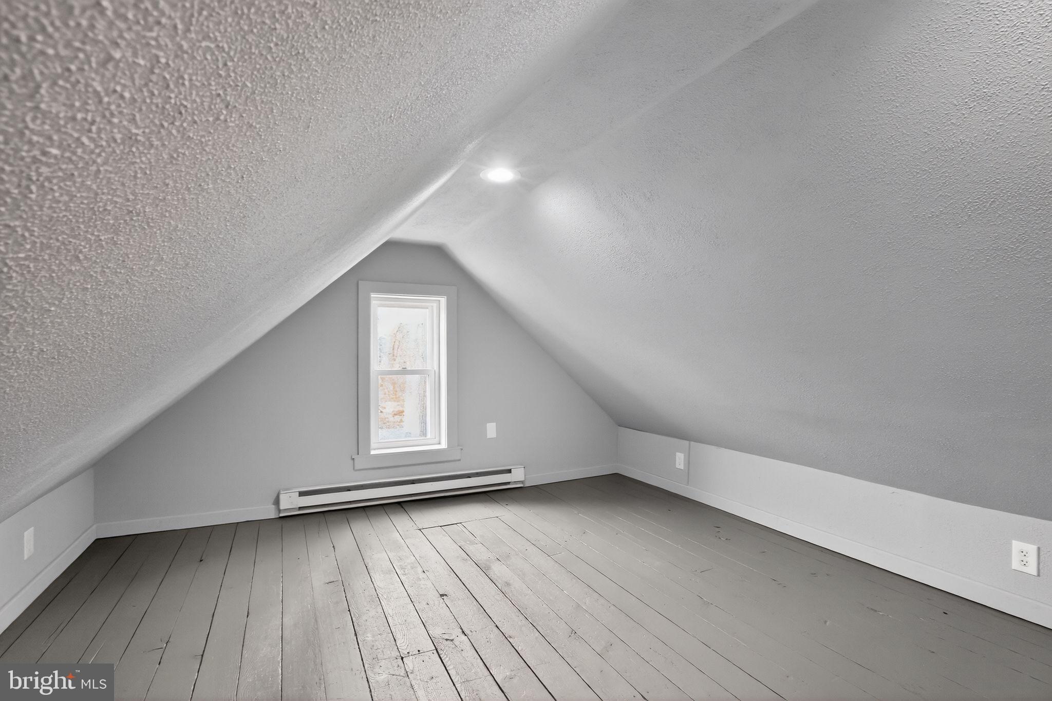 128 Maugers Mill Road Pottstown, PA 19464 - Photo 27 of 42 Charming attic space with natural light.