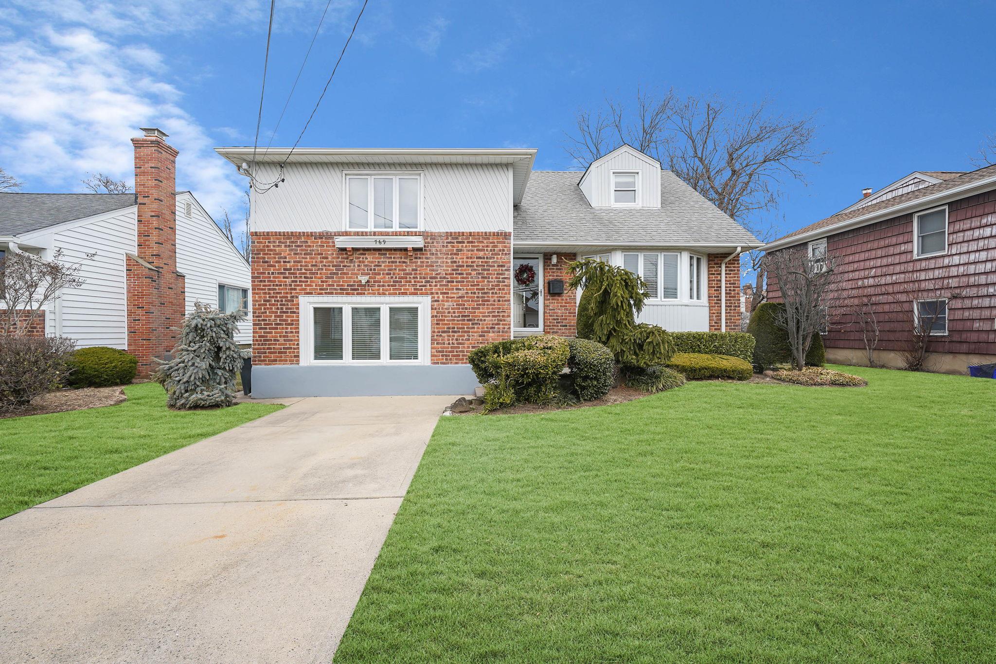 769 Washington Street Baldwin Harbor, NY 11510 - Photo 1 of 1 View of front of 769 Washington Street