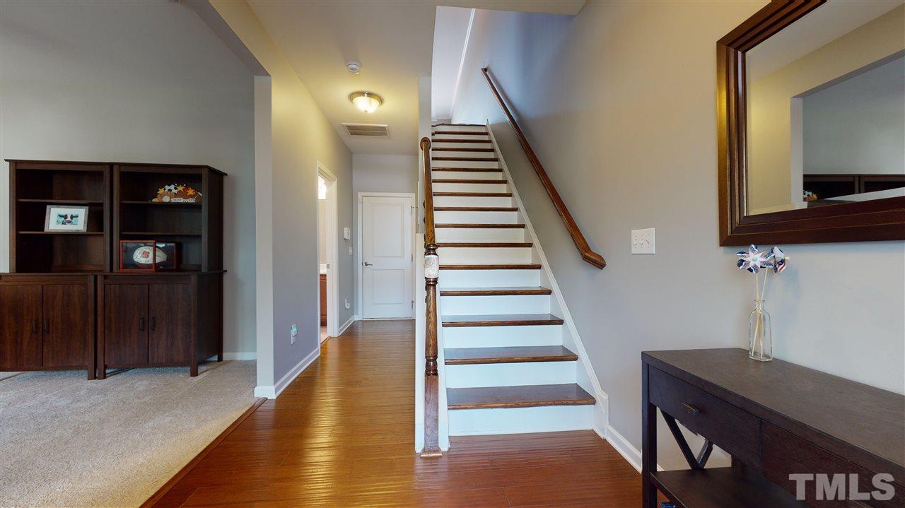 1329 Rembrandt Circle Raleigh, NC 27607 - Photo 2 of 23 a view of entryway and hall with wooden floor