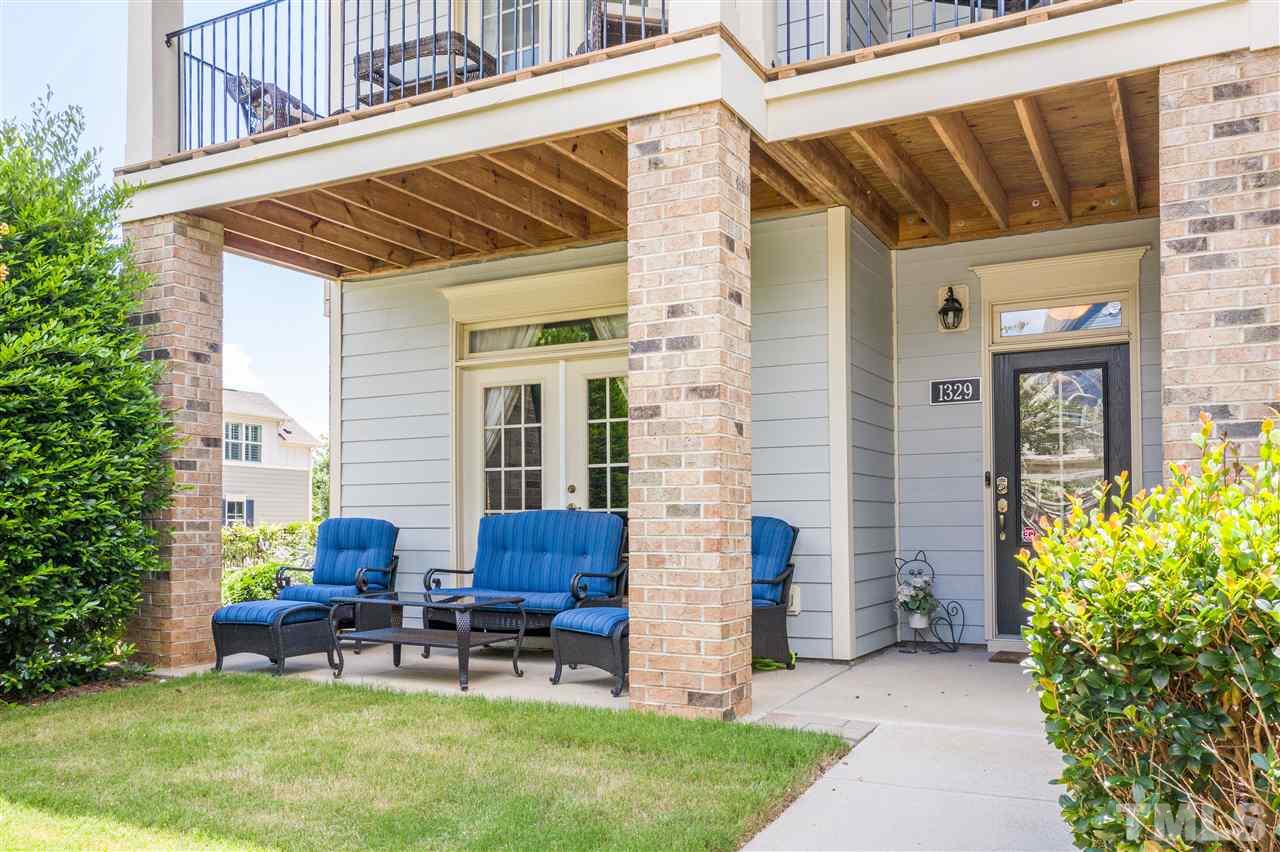 1329 Rembrandt Circle Raleigh, NC 27607 - Photo 19 of 23 a backyard of a house with outdoor seating