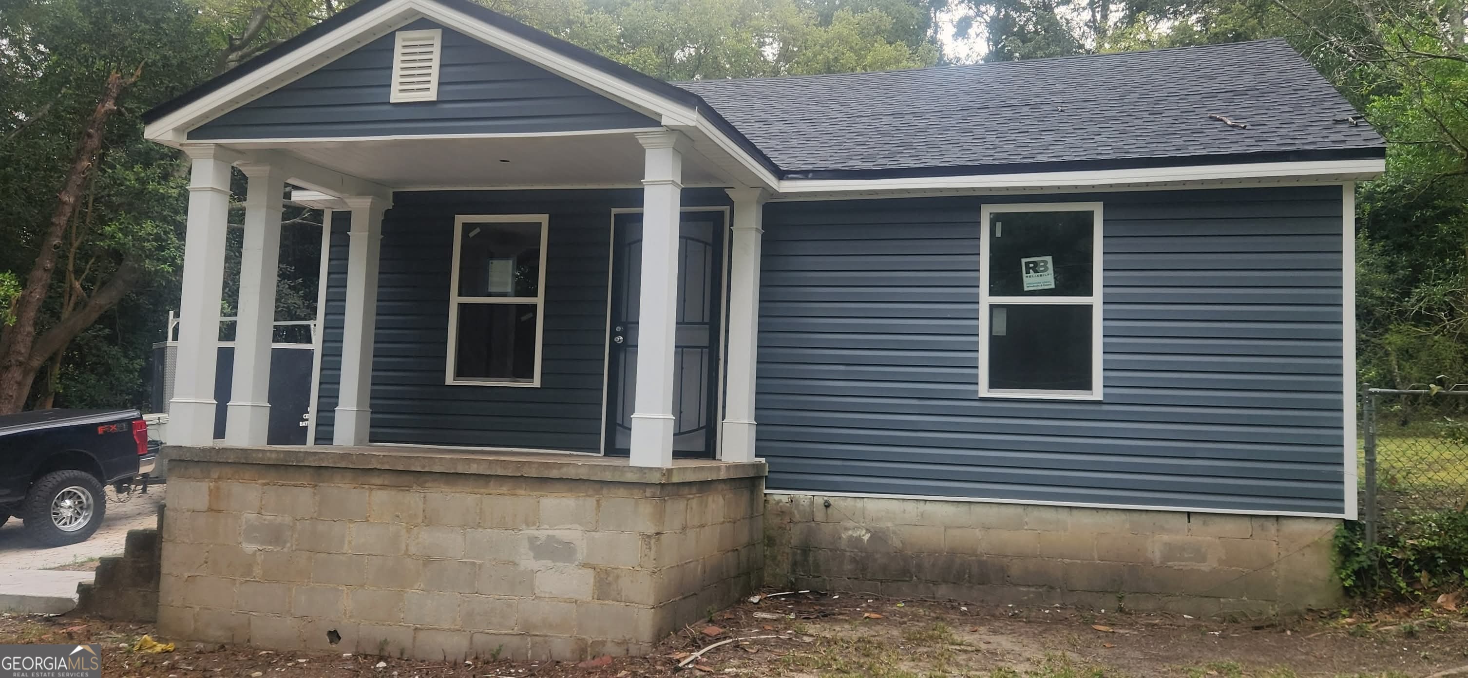 3210 Evergreen Drive Macon, GA 31206 - Photo 1 of 2 a front view of a house with a yard