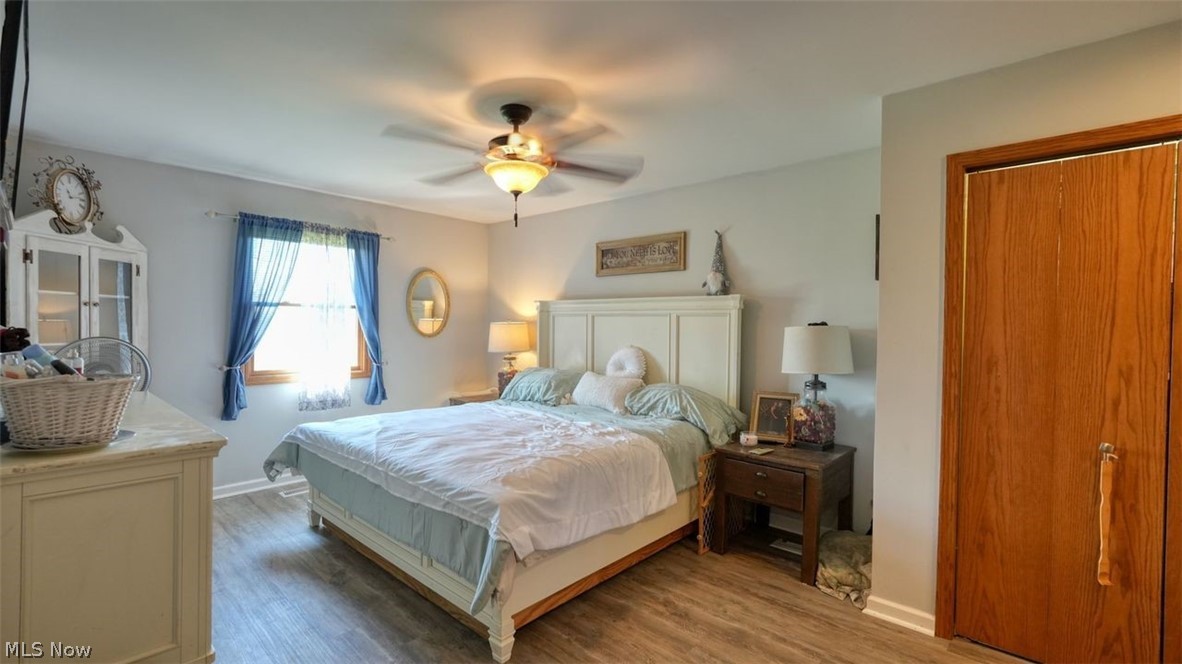 63155 Arrowhead Road Cambridge, OH 43725 - Photo 22 of 50 Bedroom with ceiling fan and hardwood / wood-style floors