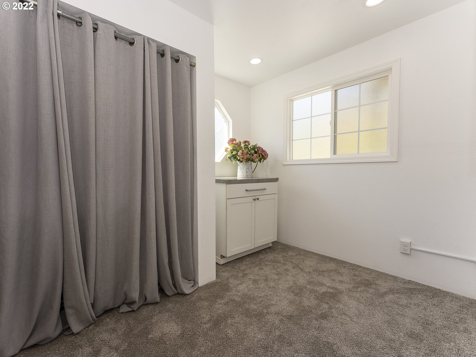23560 Northwest St Helens Road, Unit N4 Portland, OR 97231 - Photo 20 of 27 a view of a utility room with closet