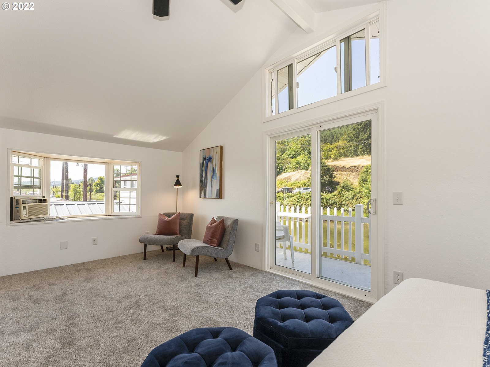 23560 Northwest St Helens Road, Unit N4 Portland, OR 97231 - Photo 25 of 27 a living room with furniture and a large window