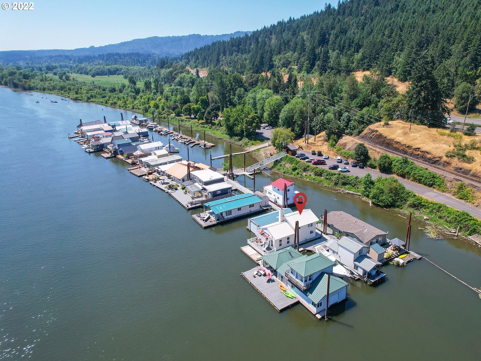23560 Northwest St Helens Road, Unit N4 Portland, OR 97231 - Photo 4 of 27 a view of a table and chairs in the garden