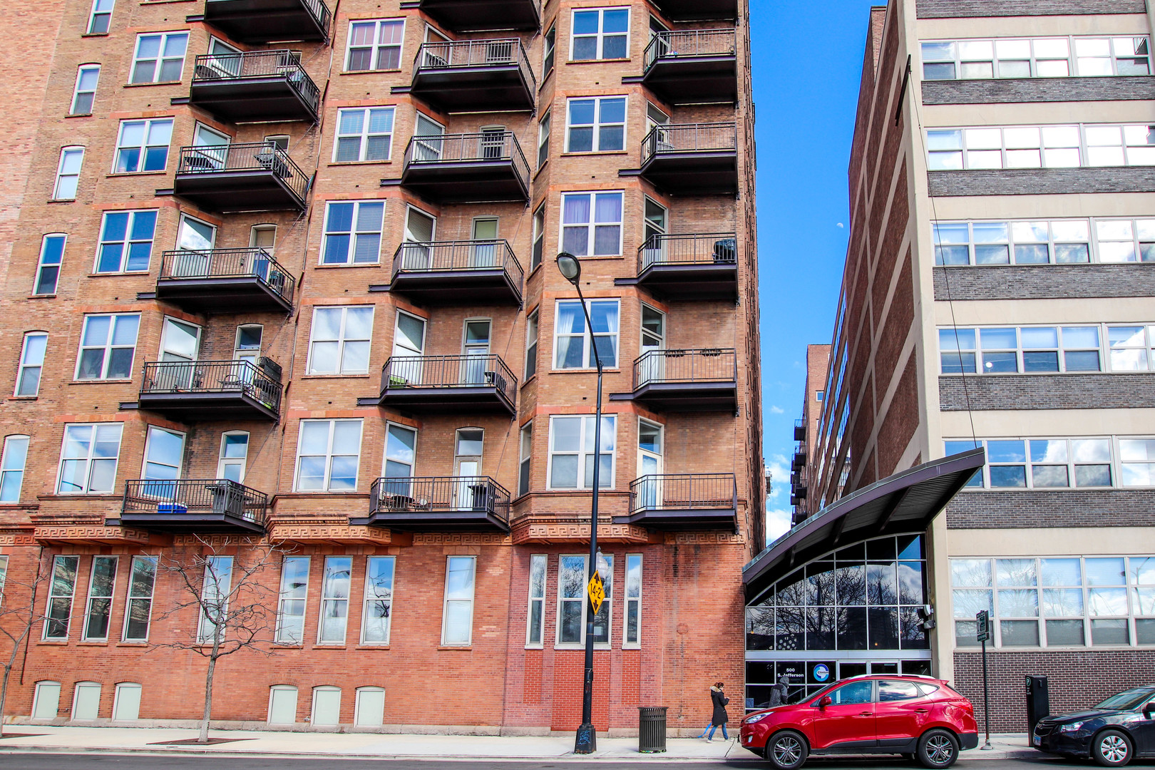 500 South Clinton Street, Unit 311 Chicago, IL 60607 - Photo 9 of 9 a car parked in front of a building