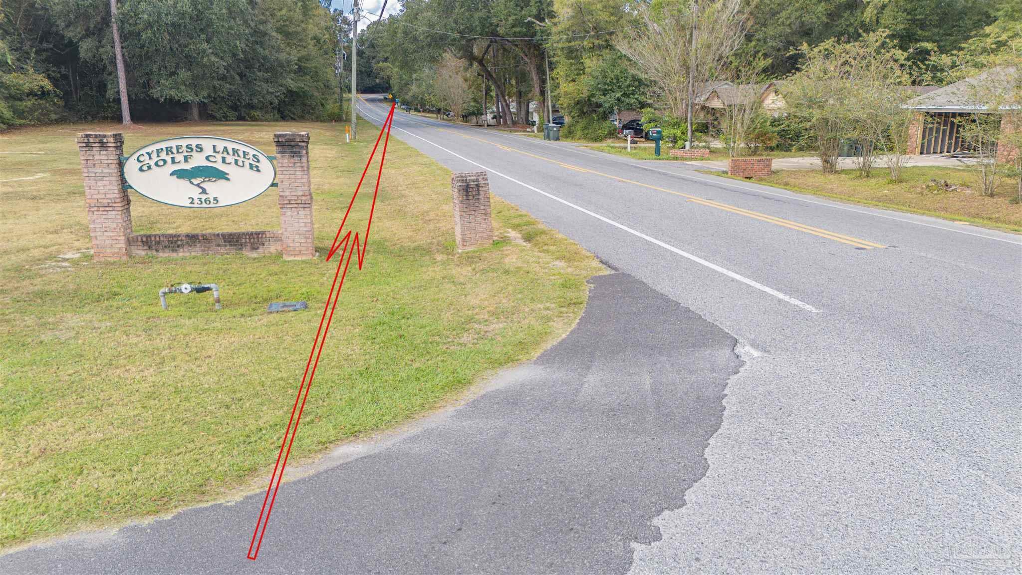 2290 Old Chemstrand Road Cantonment, FL 32533 - Photo 6 of 17 a view of a swimming pool with a patio
