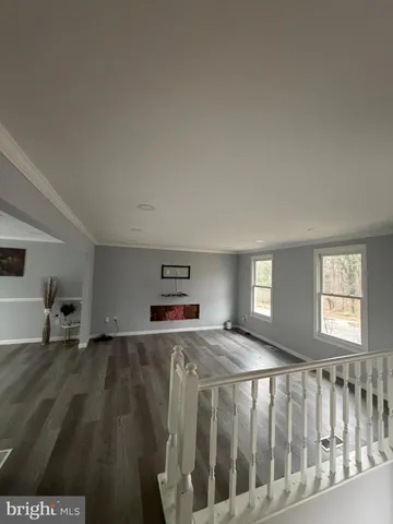 a view of a livingroom with furniture