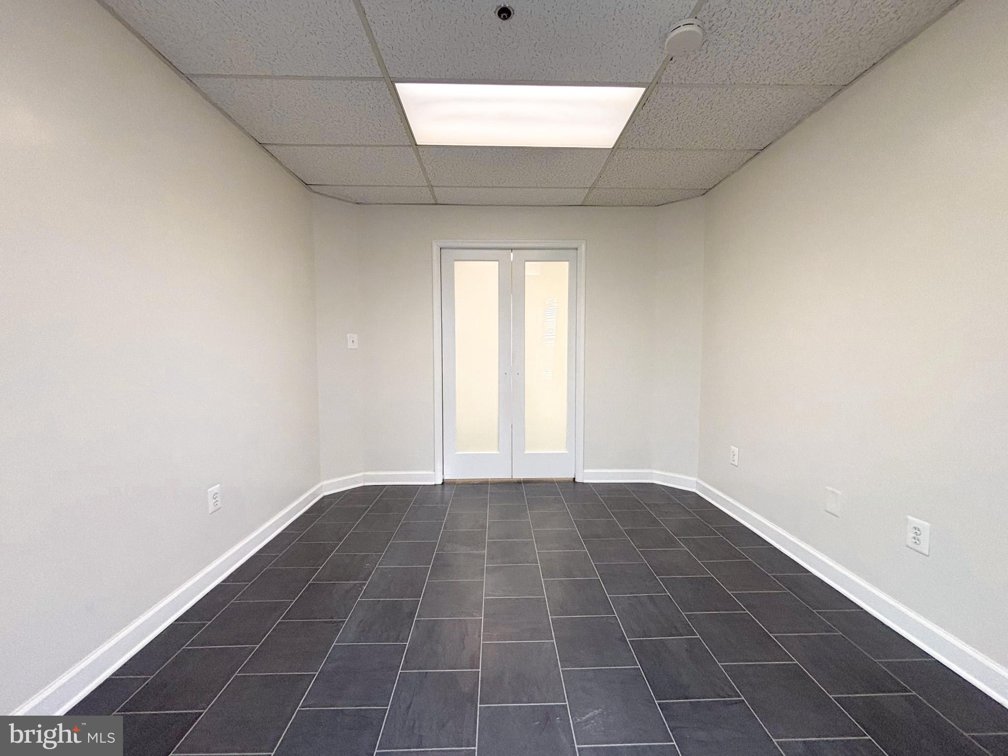 657 A Main Street, Unit A Laurel, MD 20707 - Photo 16 of 25 a view of an empty room and window