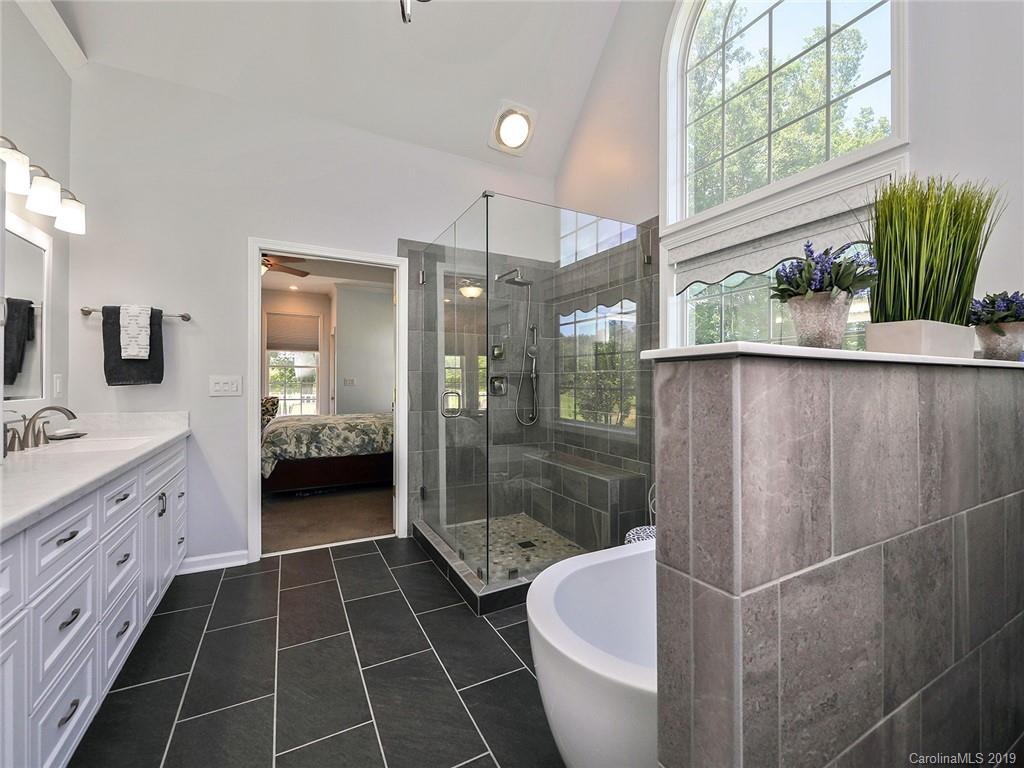 4657 Hickory Grove Road Sharon, SC 29742 - Photo 17 of 32 a bathroom with a sink toilet and shower