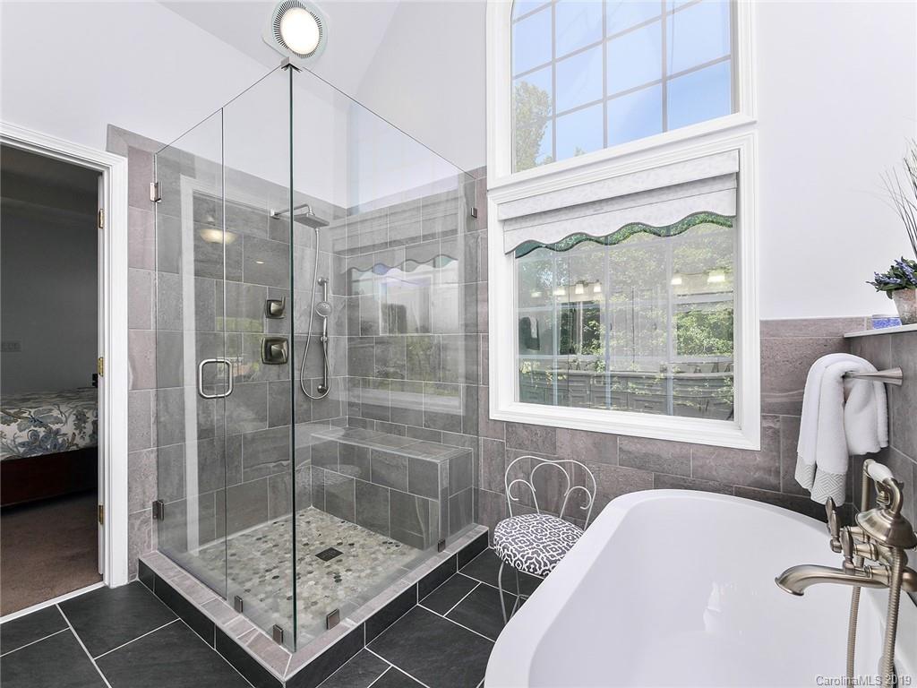 4657 Hickory Grove Road Sharon, SC 29742 - Photo 18 of 32 a bathroom with a shower and a mirror
