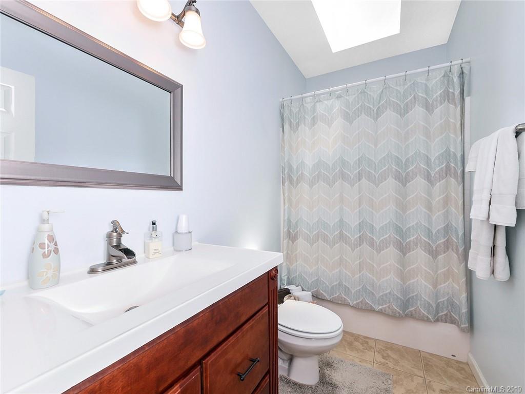 4657 Hickory Grove Road Sharon, SC 29742 - Photo 20 of 32 a bathroom with a sink toilet and shower