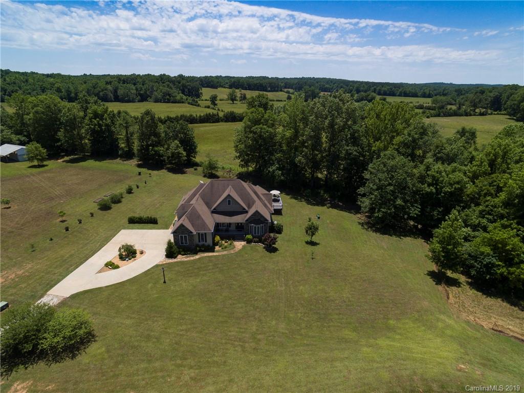 4657 Hickory Grove Road Sharon, SC 29742 - Photo 3 of 32 an aerial view of a house with a garden