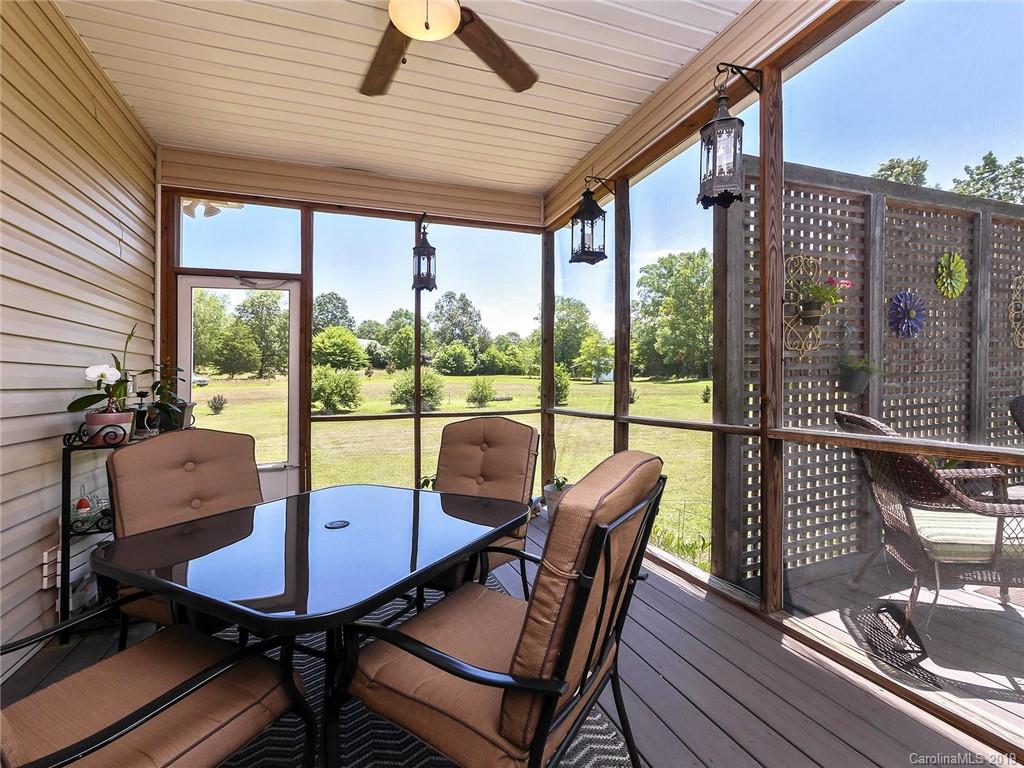 4657 Hickory Grove Road Sharon, SC 29742 - Photo 22 of 32 a view of a dining room with furniture window and outside view
