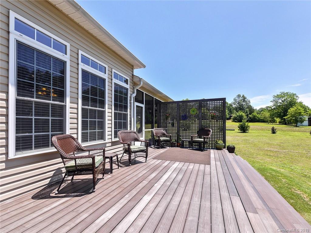 4657 Hickory Grove Road Sharon, SC 29742 - Photo 23 of 32 a view of a house with sitting area and a garden
