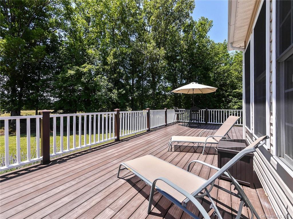 4657 Hickory Grove Road Sharon, SC 29742 - Photo 24 of 32 a view of a chairs and table on the wooden deck