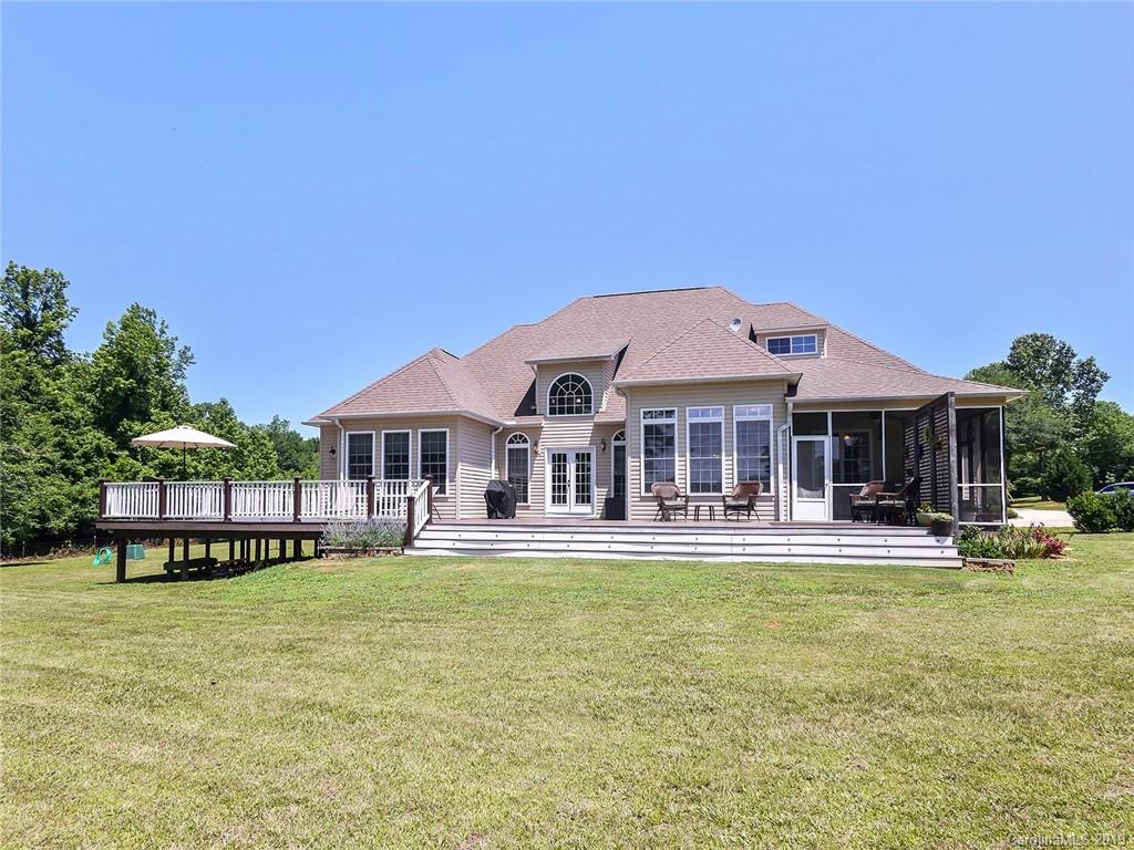 4657 Hickory Grove Road Sharon, SC 29742 - Photo 26 of 32 a front view of a house with swimming pool having outdoor seating