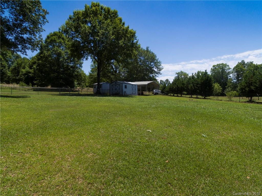 4657 Hickory Grove Road Sharon, SC 29742 - Photo 28 of 32 a view of a big yard with a large trees