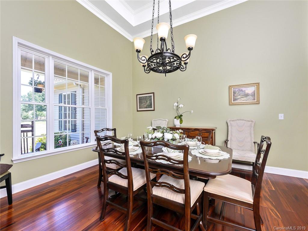 4657 Hickory Grove Road Sharon, SC 29742 - Photo 7 of 32 a view of a dining room with furniture wooden floor and chandelier