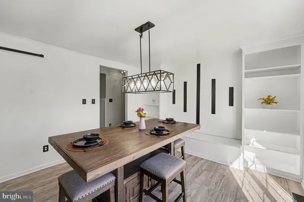 a view of a dining room and a livingroom