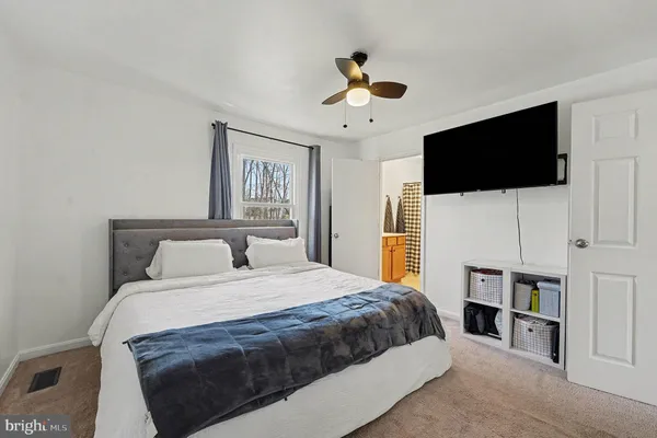 a view of livingroom with furniture and workspace