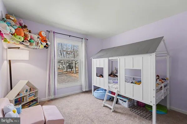 a room with toys and a living room