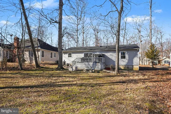 a view of the house with a swimming pool