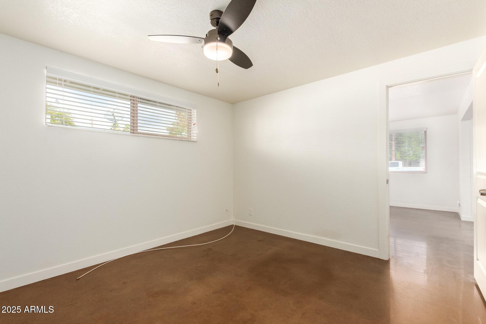 616 South Bellview, Unit C Mesa, AZ 85204 - Photo 14 of 19 an empty room with a window