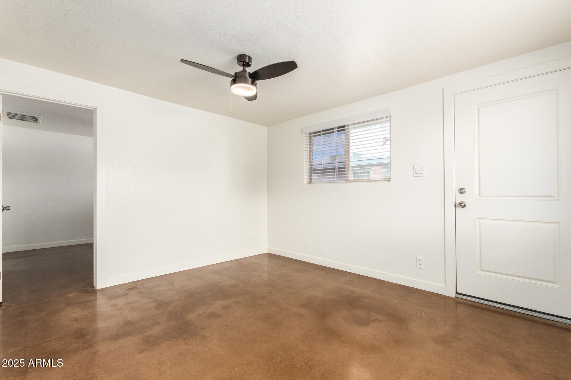 616 South Bellview, Unit C Mesa, AZ 85204 - Photo 6 of 19 a view of a big room with carpet